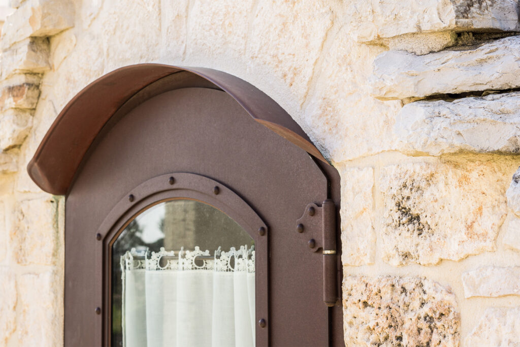 porta in ferro battuto e vetro dettaglio